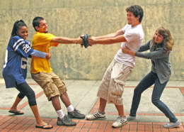 Image of modern children trying to pull apart two Magdeburg hemispheres