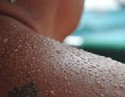 Image of sweat droplets on a person's back