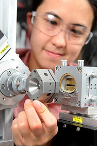 Photo of a technician using a diamond anvil cell