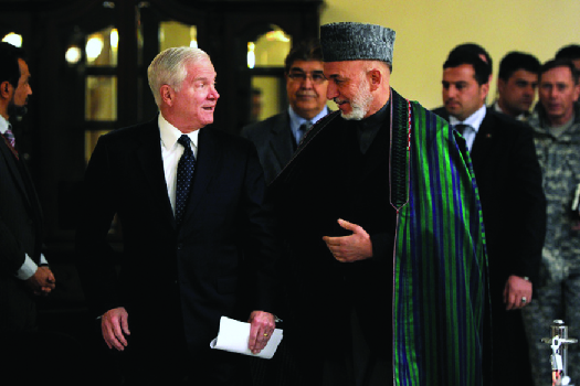 Figure 17.15 In March 2011, then-secretary of defense Robert Gates (left) held talks with Afghan president Hamid Karzai in Ka