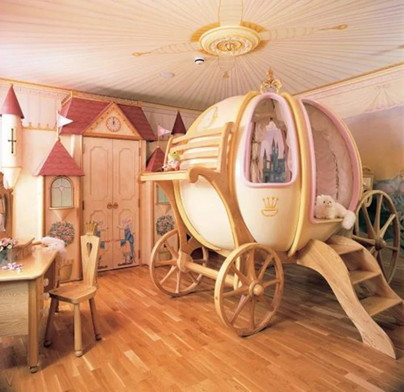 A child's bedroom with numerous design elements meant to depict a castle and fantasy. The crib appears to be a carriage like 