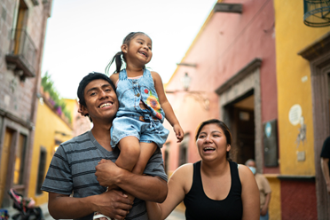 Hispanic/Latino family outdoors