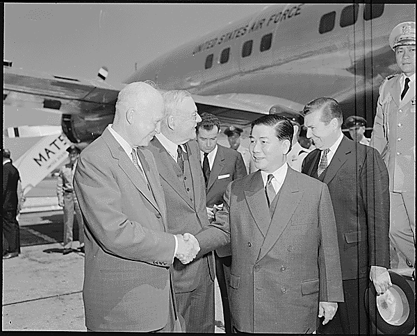 President Eisenhower and Secretary of State John Foster Dulles greet President Ngo Dinh Diem in Washington